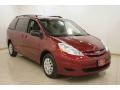 2009 Salsa Red Pearl Toyota Sienna LE  photo #1