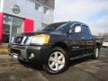 2009 Timberline Green Nissan Titan LE Crew Cab 4x4  photo #1