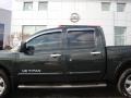 2009 Timberline Green Nissan Titan LE Crew Cab 4x4  photo #19