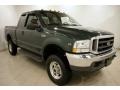 2003 Dark Highland Green Metallic Ford F350 Super Duty Lariat SuperCab 4x4  photo #1