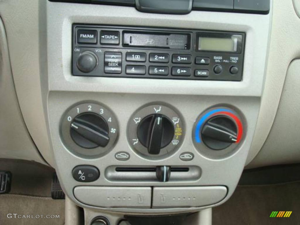 2003 Accent GL Coupe - Quartz Green Metallic / Beige photo #15