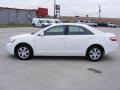 Super White - Camry LE Photo No. 6