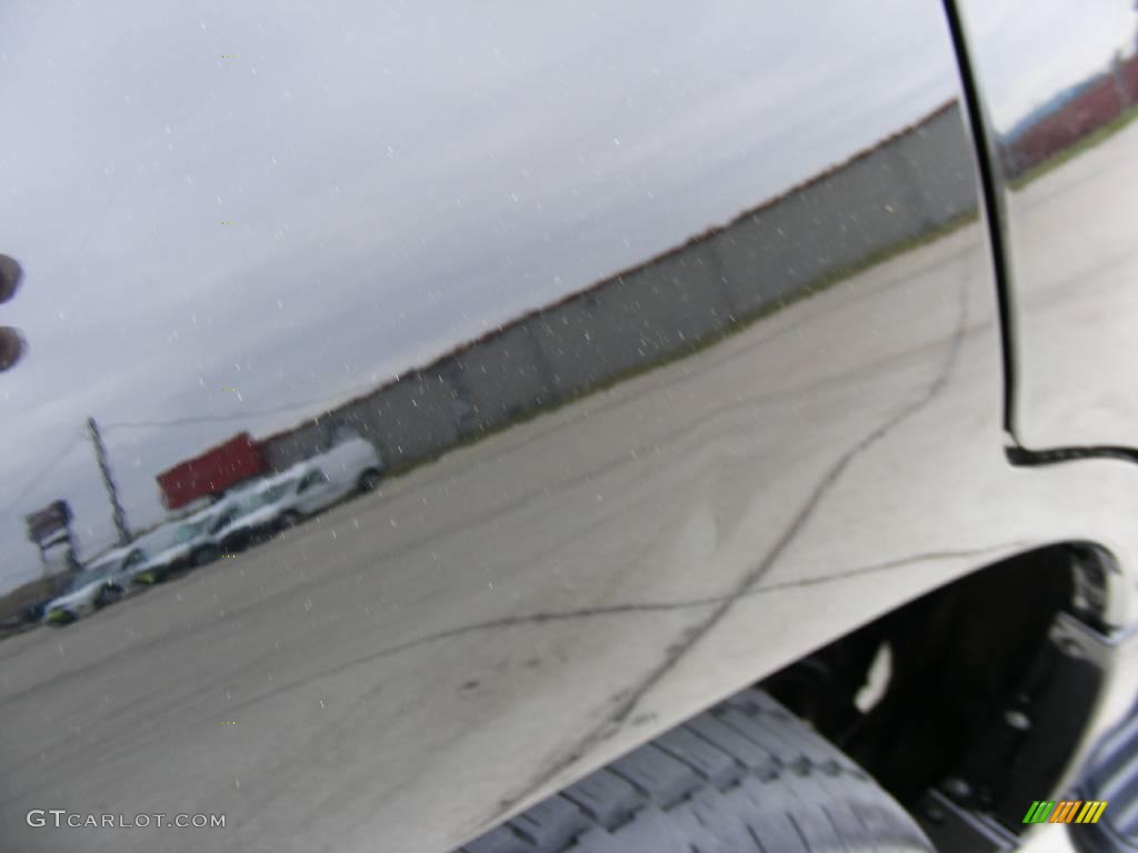 2005 Mariner V6 Premier 4WD - Black / Black/Light Parchment photo #18