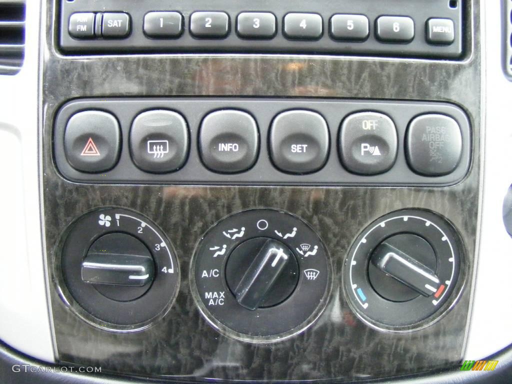 2005 Mariner V6 Premier 4WD - Black / Black/Light Parchment photo #42