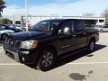 2005 Galaxy Black Nissan Titan LE Crew Cab  photo #1