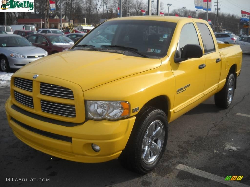 2005 Ram 1500 SLT Quad Cab 4x4 - Solar Yellow / Dark Slate Gray photo #14