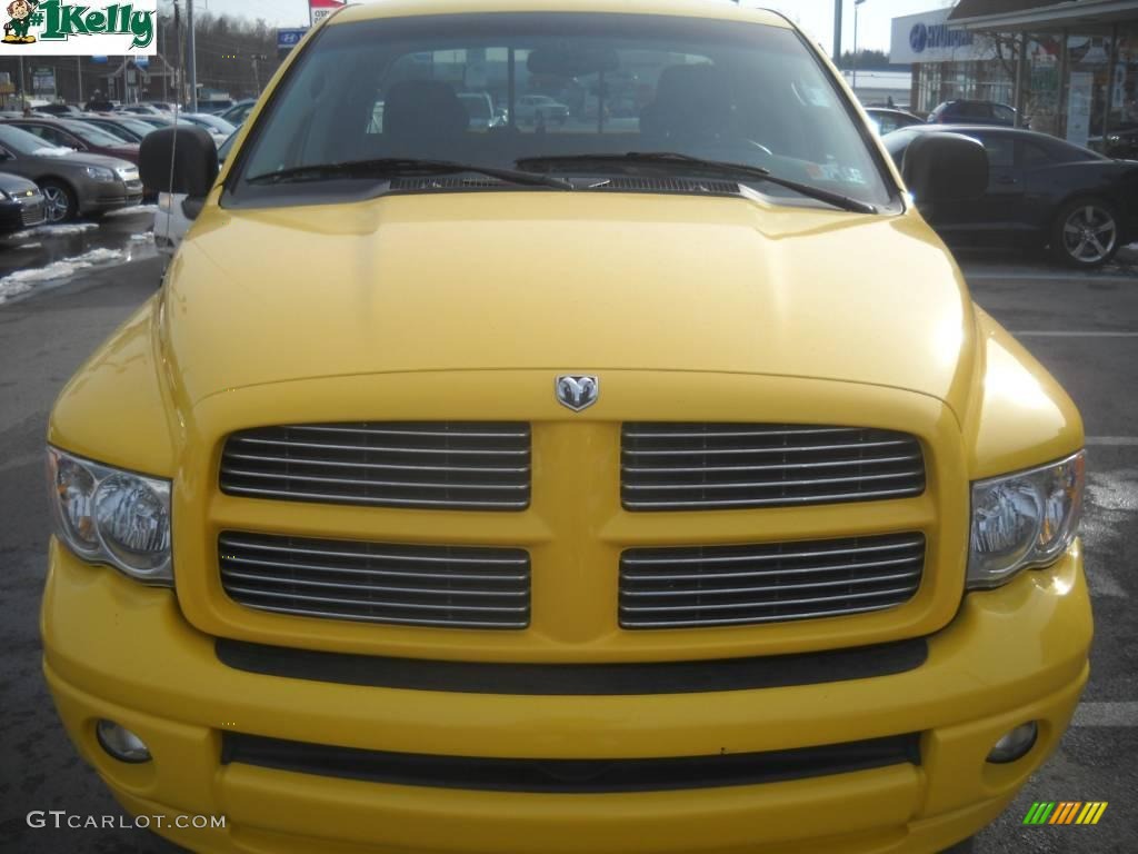 2005 Ram 1500 SLT Quad Cab 4x4 - Solar Yellow / Dark Slate Gray photo #15