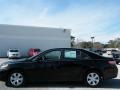 2009 Black Toyota Camry LE  photo #2