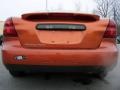 2005 Fusion Orange Metallic Pontiac Grand Prix Sedan  photo #6