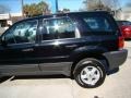 2003 Black Clearcoat Ford Escape XLS V6 4WD  photo #30