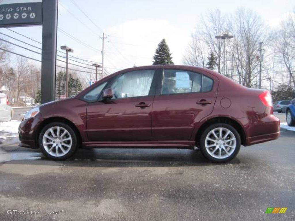 2008 SX4 Sport Sedan - Cherry Red Metallic / Black photo #6