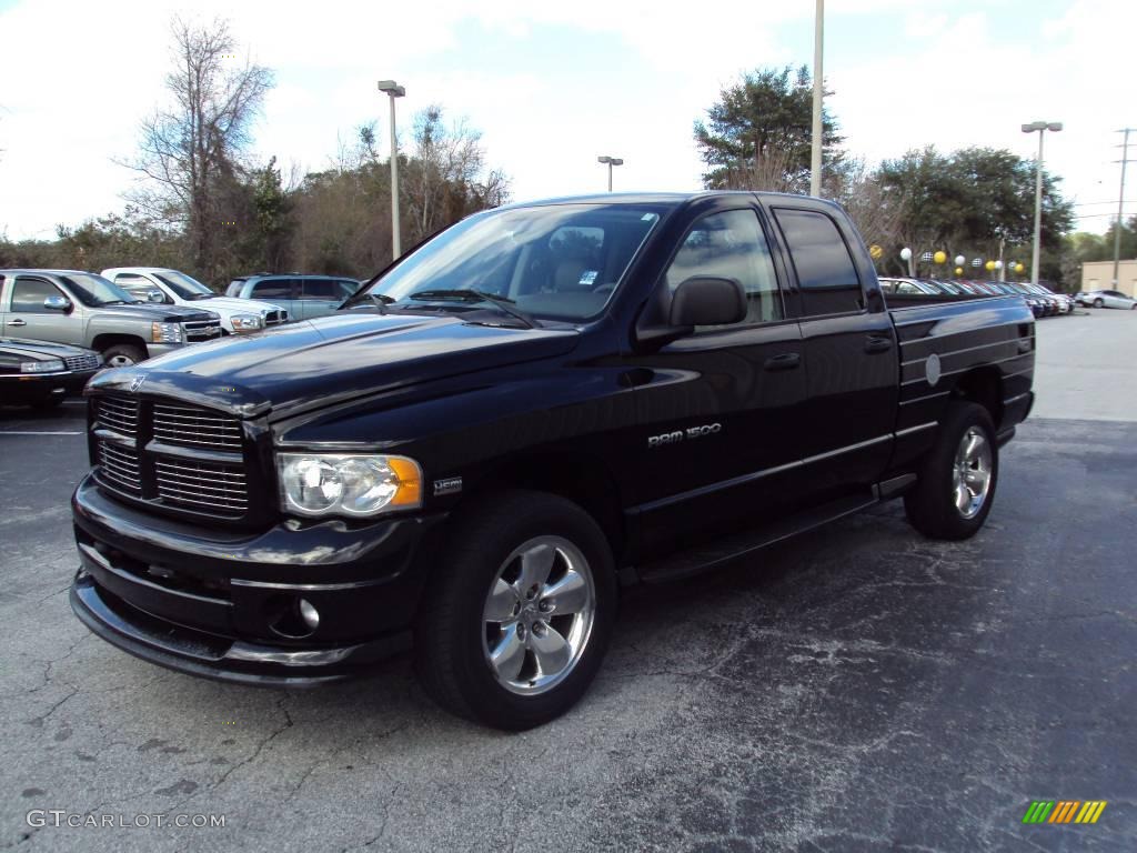 2003 Ram 1500 Laramie Quad Cab 4x4 - Black / Taupe photo #1