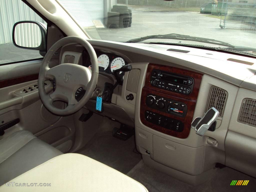 2003 Ram 1500 Laramie Quad Cab 4x4 - Black / Taupe photo #11
