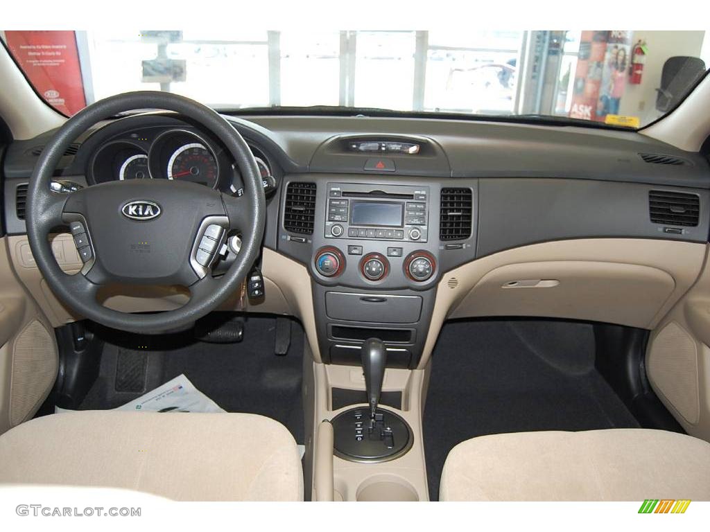 2009 Optima LX - Ruby Red / Beige photo #13