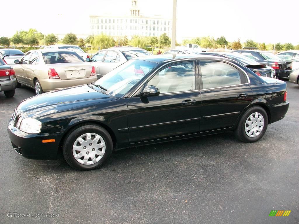 2006 Optima LX - Black / Beige photo #1