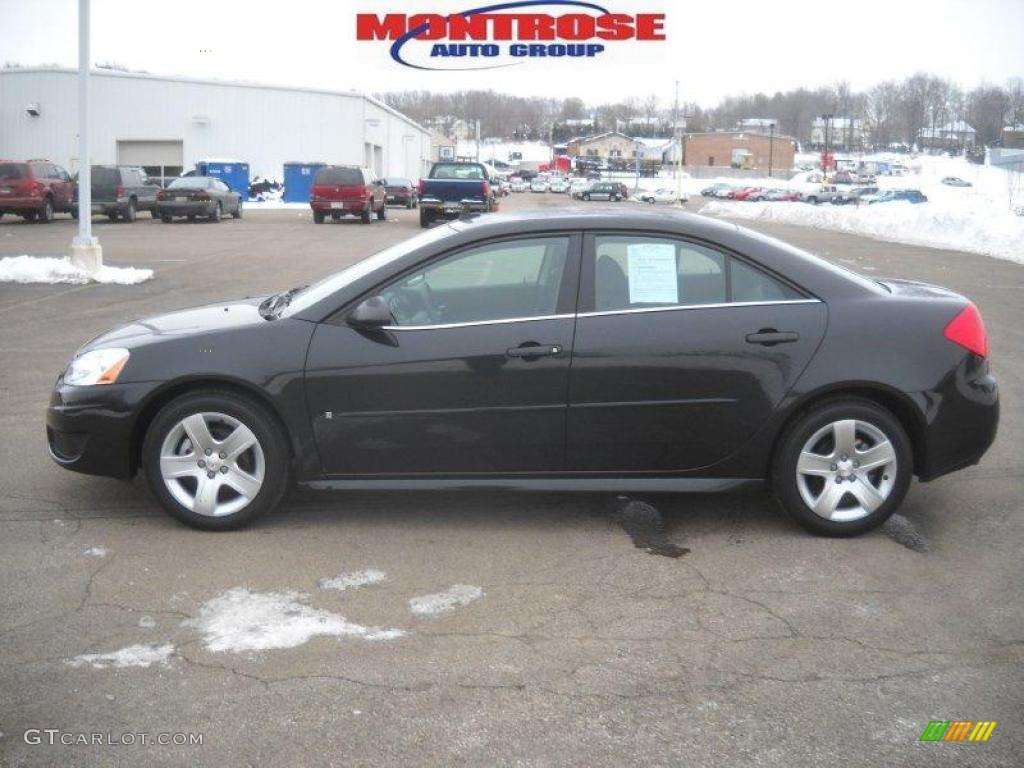 2009 G6 Sedan - Carbon Black Metallic / Ebony photo #7
