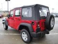 2010 Flame Red Jeep Wrangler Unlimited Sport 4x4  photo #5