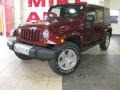 2010 Red Rock Crystal Pearl Jeep Wrangler Unlimited Sahara 4x4  photo #1