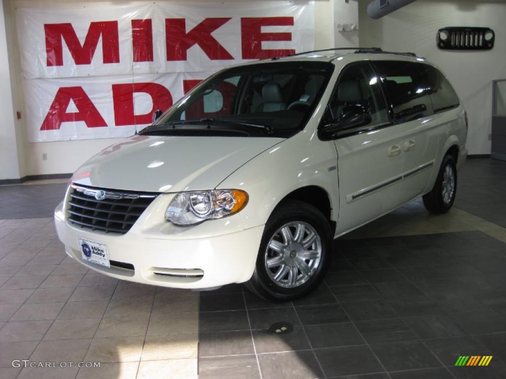 Cool Vanilla White Chrysler Town & Country