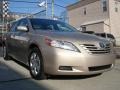 2009 Desert Sand Metallic Toyota Camry LE  photo #4