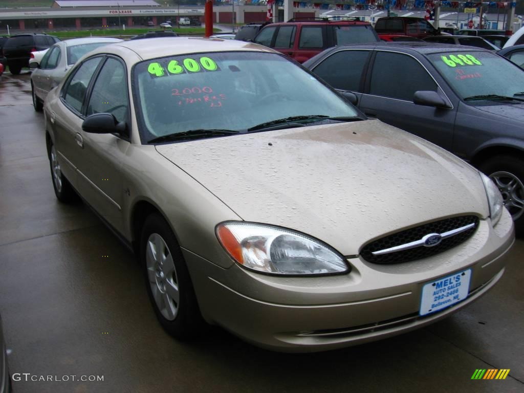 Harvest Gold Metallic Ford Taurus