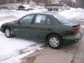 2000 Spruce Green Metallic Pontiac Sunfire SE Sedan #25793106