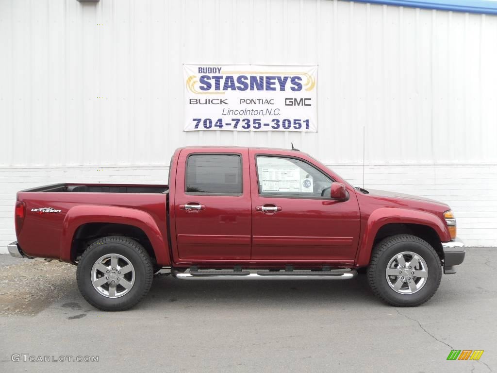 2010 Canyon SLE Crew Cab 4x4 - Merlot Jewel Metallic / Ebony photo #1