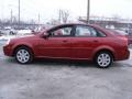 2004 Fusion Red Metallic Suzuki Forenza S  photo #2