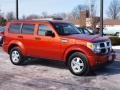 Sunburst Orange Pearl - Nitro SE 4x4 Photo No. 2
