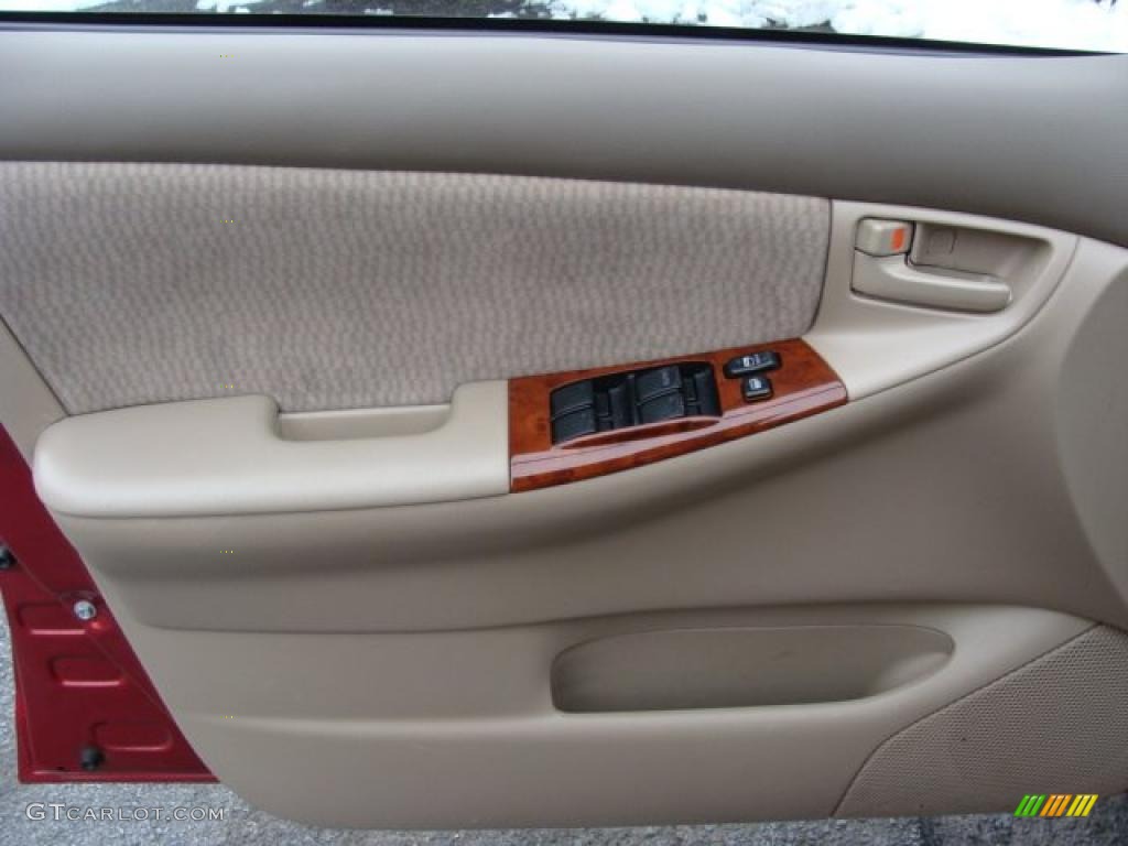 2007 Corolla LE - Impulse Red Pearl / Beige photo #6