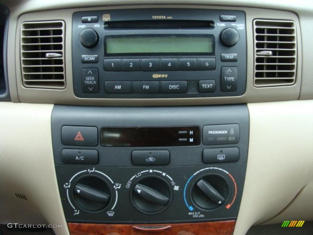 2007 Corolla LE - Impulse Red Pearl / Beige photo #11