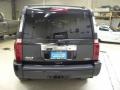 2009 Brilliant Black Crystal Pearl Jeep Commander Limited  photo #17