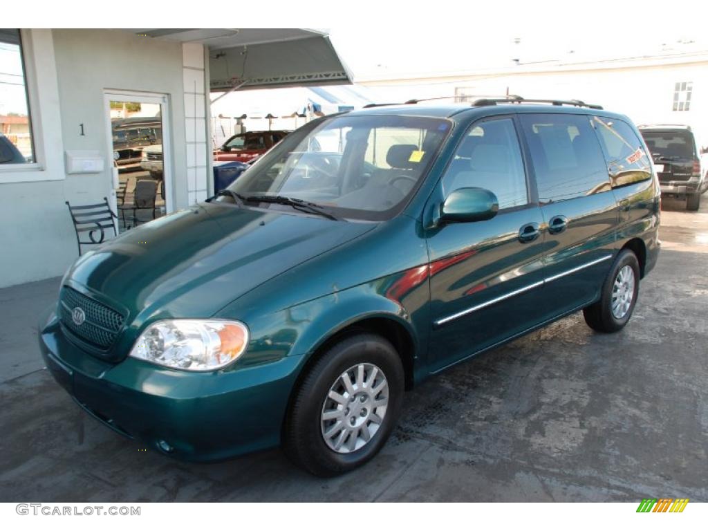 Dark Green Emerald Metallic Kia Sedona