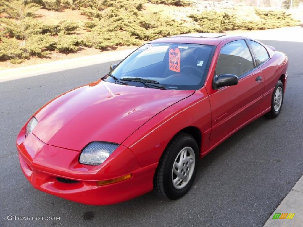 Bright Red Pontiac Sunfire. 