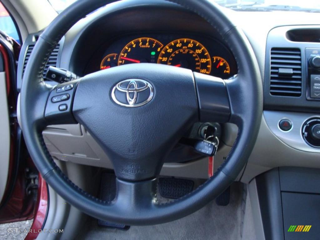 2005 Camry LE - Salsa Red Pearl / Taupe photo #22