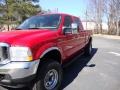 2003 Red Clearcoat Ford F250 Super Duty XLT Crew Cab 4x4  photo #2