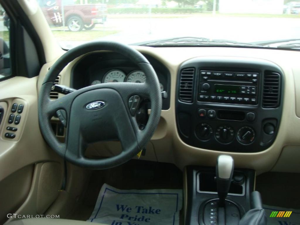 2006 Escape XLS - Black / Medium/Dark Pebble photo #14