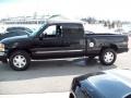 2005 Onyx Black GMC Sierra 1500 SLT Extended Cab 4x4  photo #10