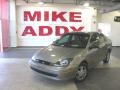 2003 Arizona Beige Metallic Ford Focus SE Sedan  photo #1