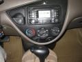 2003 Arizona Beige Metallic Ford Focus SE Sedan  photo #15