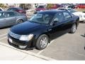 Black Clearcoat - Taurus SEL Photo No. 1