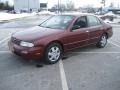1997 Garnet Red Pearl Nissan Altima GXE  photo #1