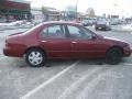 1997 Garnet Red Pearl Nissan Altima GXE  photo #10