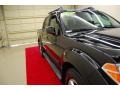 2008 Super Black Nissan Frontier LE Crew Cab  photo #14