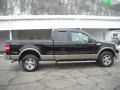 2005 Black Ford F150 XLT SuperCab 4x4  photo #1