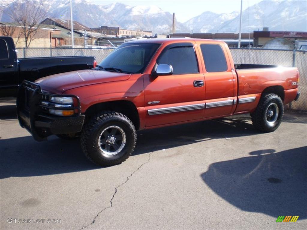 2001 Silverado 1500 LT Extended Cab 4x4 - Sunset Orange Metallic / Medium Gray photo #1