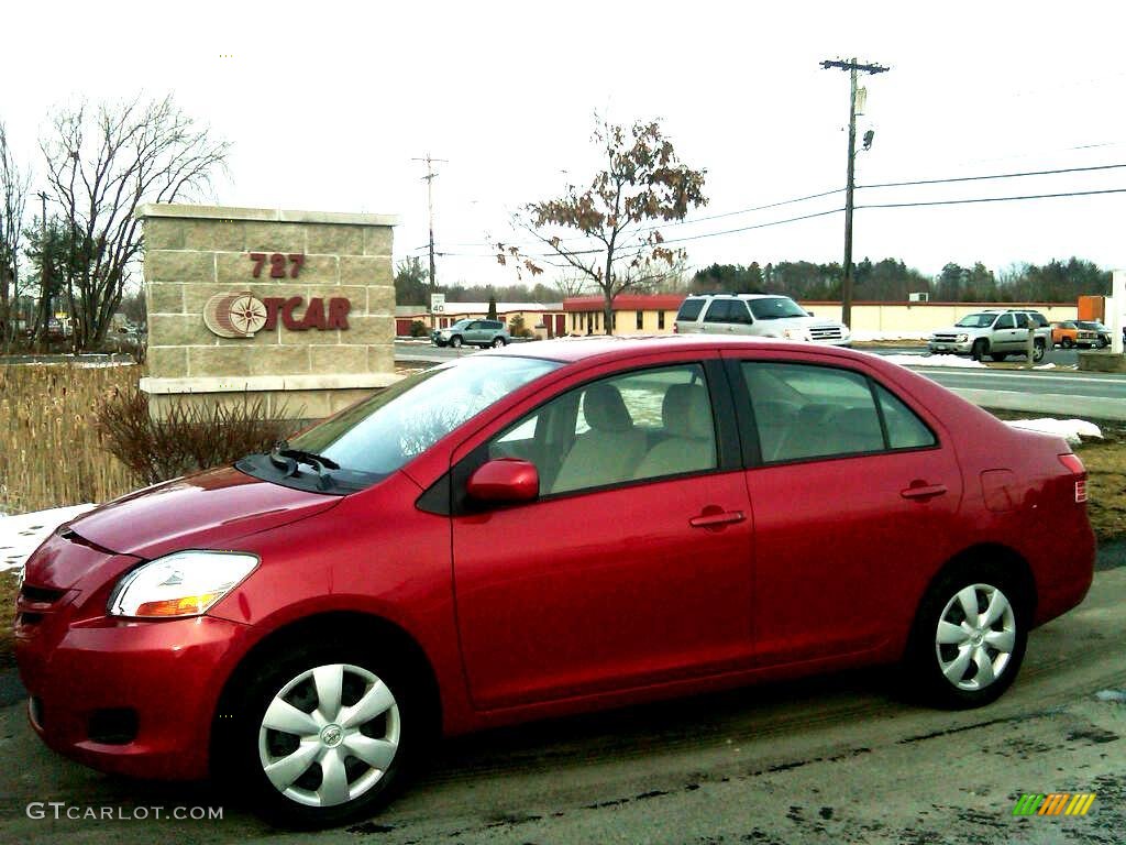 2007 Yaris Sedan - Absolutely Red / Bisque photo #1