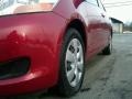 2007 Absolutely Red Toyota Yaris Sedan  photo #2