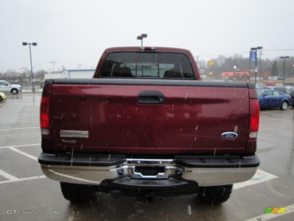 2005 F350 Super Duty FX4 Crew Cab 4x4 - Dark Toreador Red Metallic / Black photo #4