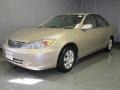 2003 Desert Sand Mica Toyota Camry LE  photo #1